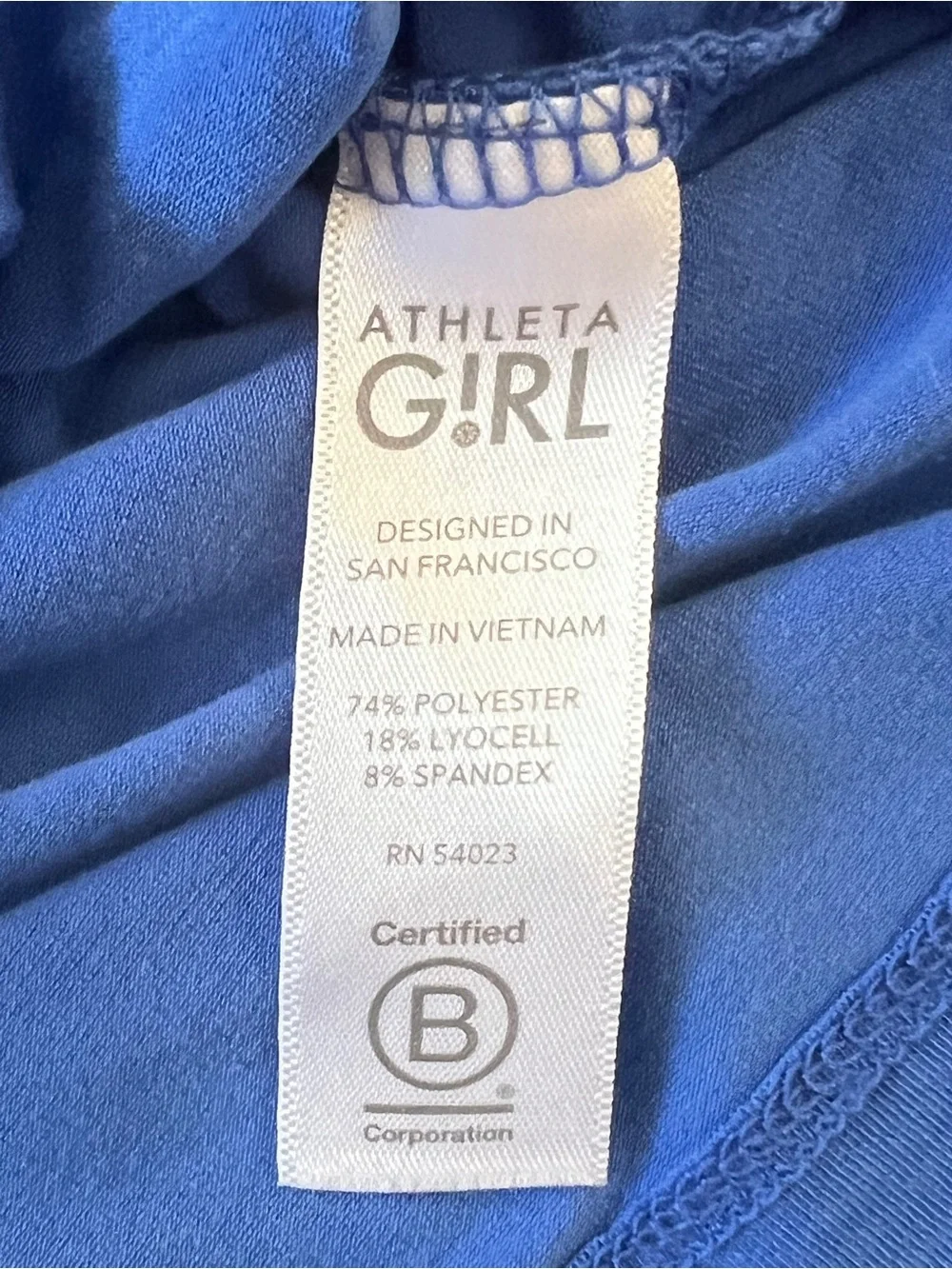 Athleta Royal Blue Short Sleeve Pocket Tee with Lime & Teal Stripes